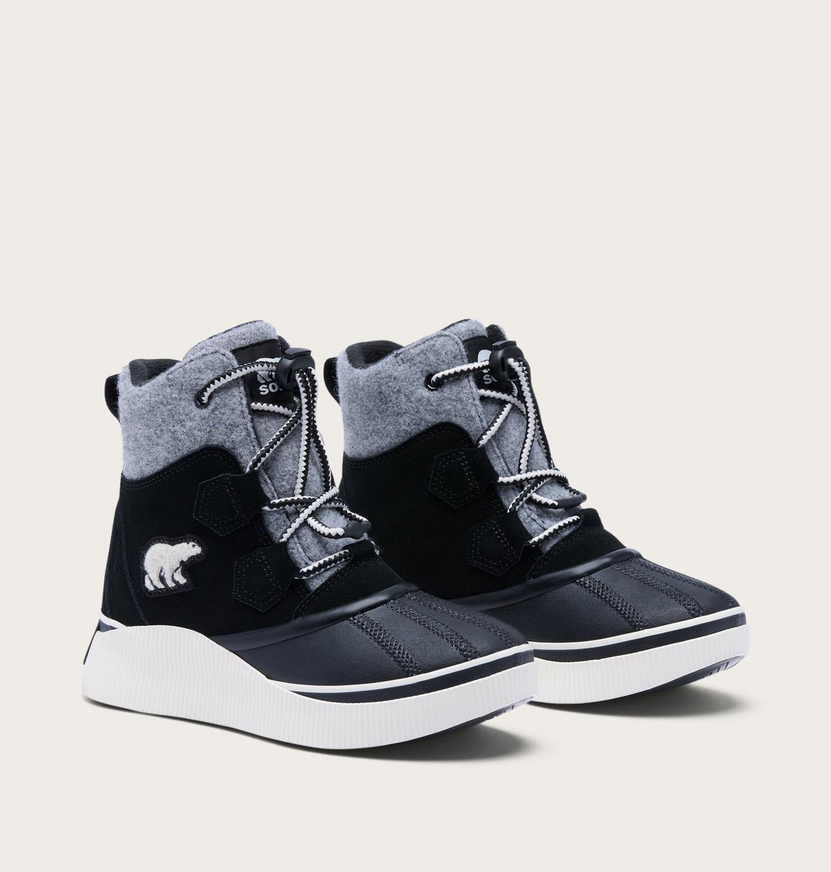 Big Kids Out N About™ IV Chillz Winter Boot - Black, Chalk