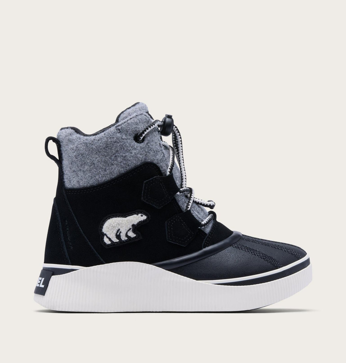 Big Kids Out N About™ IV Chillz Winter Boot - Black, Chalk