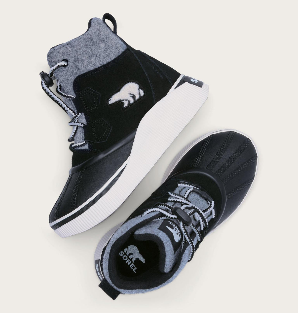 Big Kids Out N About™ IV Chillz Winter Boot - Black, Chalk